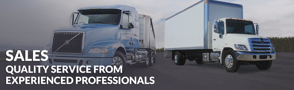 Two trucks with overlay text that says sales